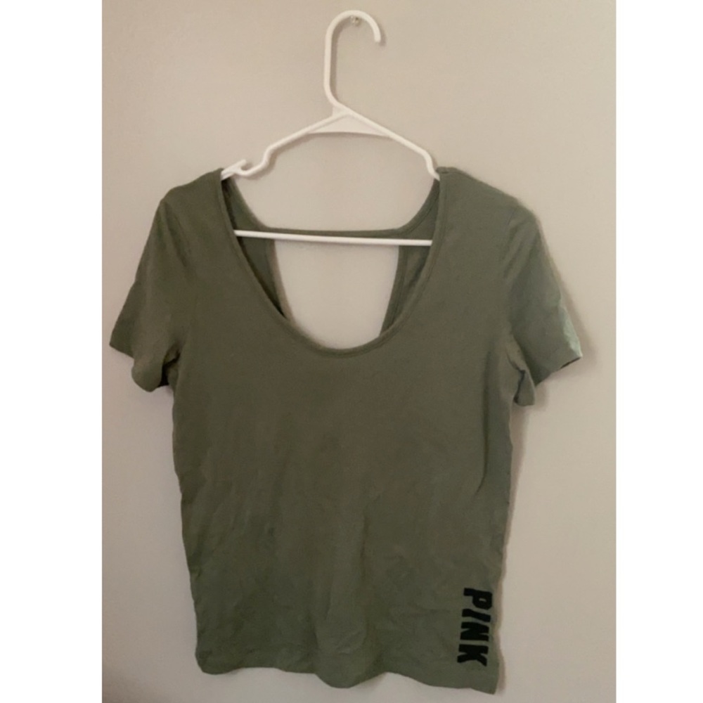 Green shirt from pink